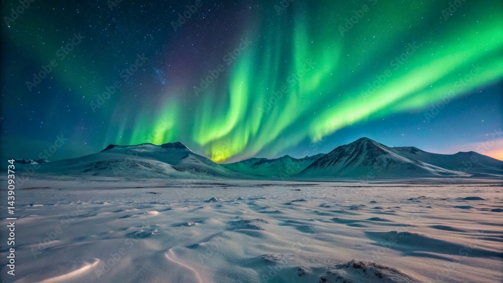 Fototapeta premium Majestic Northern Lights Dance Over Snowy Mountain Landscape at Night in Arctic Region