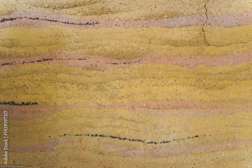 Obraz na płótnie Layered Earth-Toned Wall with Natural Cracks and Stratification w salonie