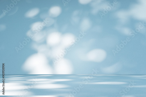 Wall interior background, studio and backdrops show products. with soft light shadow from window color blue and white. background for text insertion and presentation of product	
