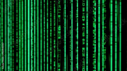 A Dark background with cascading strings of green alphanumeric characters. The characters vary in size and are densely packed, creating a vertical flow.
