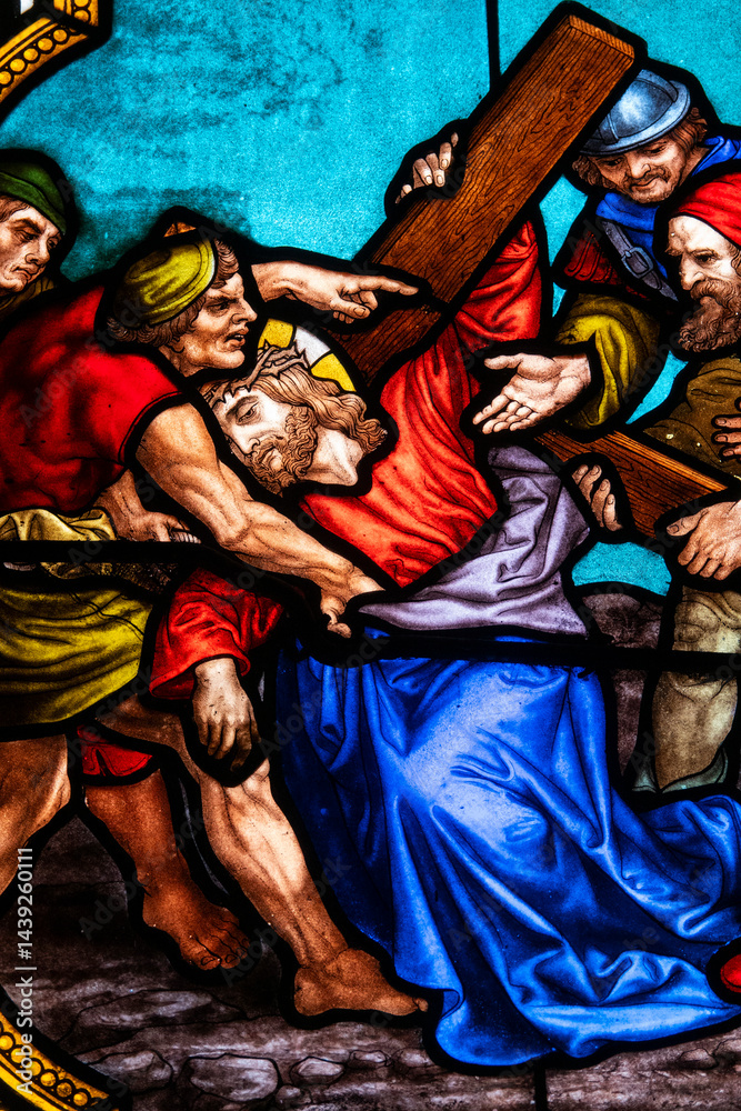 Obraz premium Hasparren, France - 04-22-2025: Stained glass (19th century) of The Way of the Cross. Seventh station: Jesus falls for the second time. ..