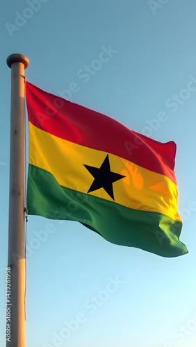 Ghana's colorful flag waves boldly, its red-gold-green stripes and black star glowing under African sun. Vibrant HD wallpaper.