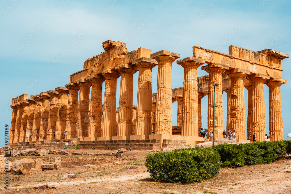 Obraz premium Greek temples at Selinunte of Temple of Hera Temple E with ruins of Greek columns in Selinunte Archaeological Park Sicily Italy