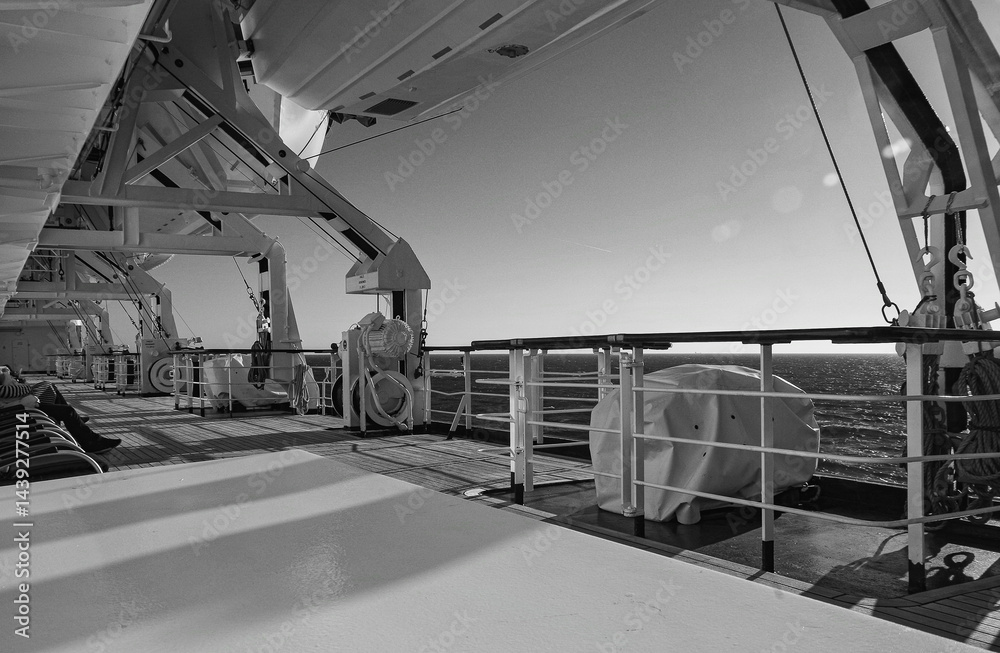 Beautiful breathtaking sunset blue hour twilight panorama at sea with dramatic sky seen from outdoor deck of classic cruiseship cruise ship liner sailing on ocean
