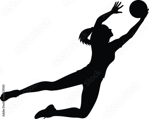 Silhouette of a woman jumping to catch a ball with her arms extended above her head in action