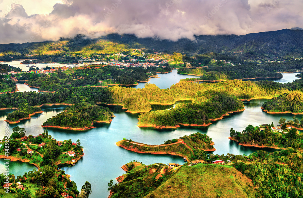 Aerial view of Penol-Guatape Reservoir in Colombia, with vibrant landscapes and shimmering waters