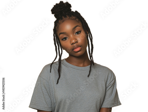 Portrait of a young woman with dreadlocks and a contemplative gaze against isolation transparent