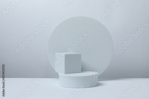 White podiums on a light background