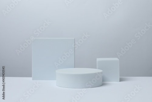 White podiums on a light background