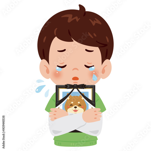 愛犬の遺影を抱いて泣く男の子