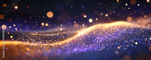 A blue and gold sparkly surface with many small dots. The surface is a wave of glitter