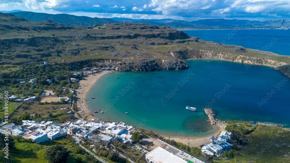 Obraz premium Lindos Beach Megali Paralia, the large and sandy beach of Lindos is one of the most beautiful beaches on the Rhodes island.
