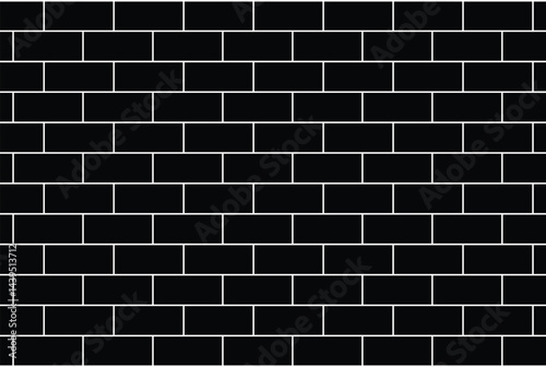 Pattern of black and white bricks arranged in a traditional horizontal layout