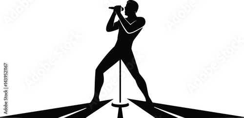 Silhouette of a stylish male singer performing on stage with dynamic lighting and microphone stand