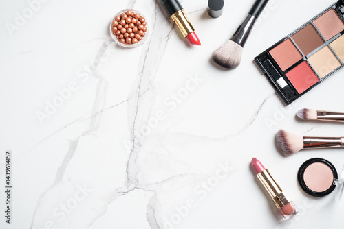 Obraz na płótnie Make up products at white marble background. Cosmetic palette, brushes and lipsticks. Top view with copy space. w salonie