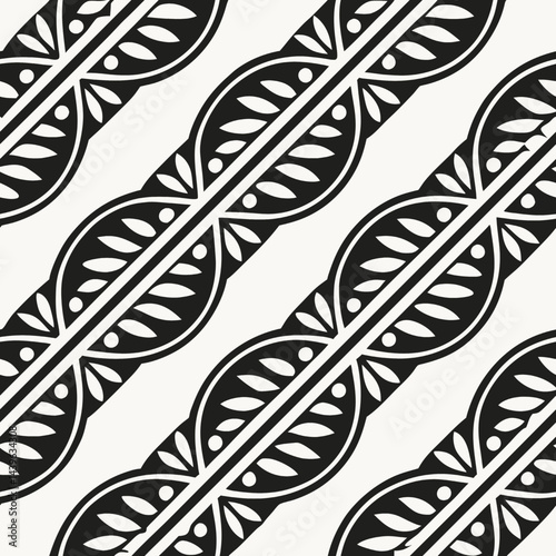 Elegant vector illustration of a seamless pattern with black bird feathers for artistic wallpaper design