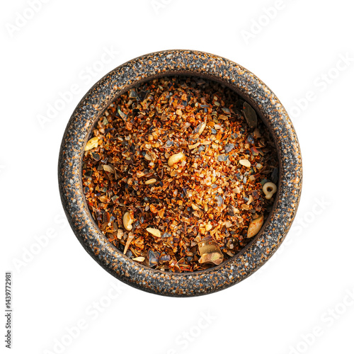 Fototapeta Naklejka Na Ścianę i Meble -  A round stone bowl filled with various Jerk Seasoning spices and herbs, showcasing an assortment of textures and colors isolated on white background and transparent background