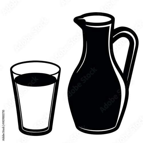 A transparent glass jug and a clear glass show a liquid drink, possibly water, milk, or juice