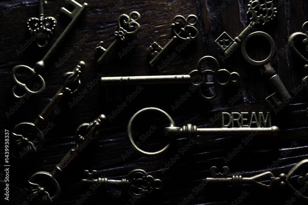 Vintage Skeleton Keys on Dark Wooden Surface - Antique Key Collection Background