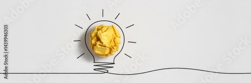Simple illustration of a crumpled paper lightbulb photo
