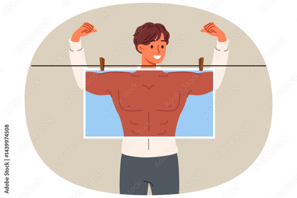Man bodybuilder dreams of pumped up muscles and ripped abs with biceps, hiding behind photo with fake body. Bodybuilder guy visualizes result of sports training and exercise in fitness club