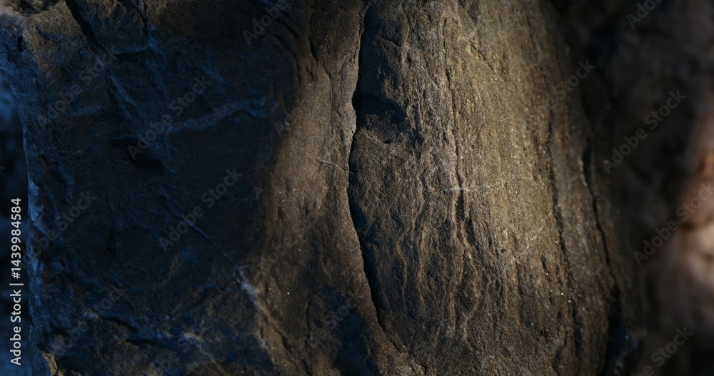 Fototapeta premium Rock Formation with Cracks and Light Contrast