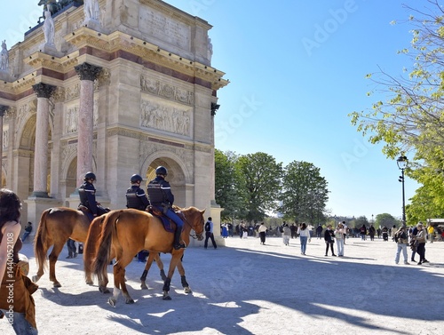 Female gendarmes patrol the city on horseback.