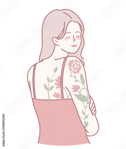 A fashionable young woman confidently showcasing her vibrant, colorful floral tattoos on her exposed arm
