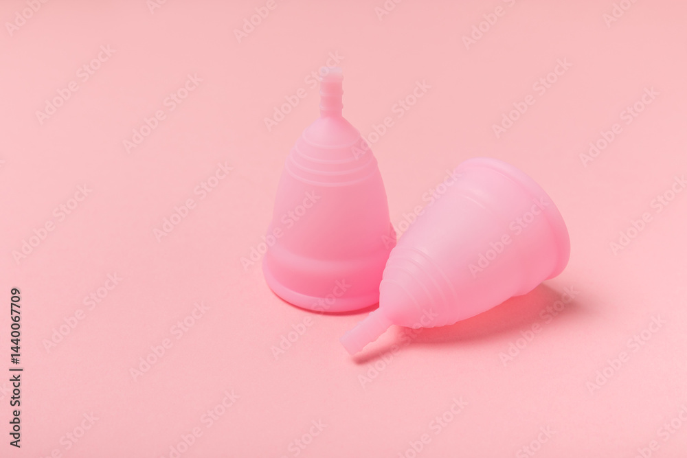 Menstrual cup on a bright background. Sanitary napkins, tampons and menstrual cup.Concept of critical days, menstruation.feminine hygiene product. Women health concept.Premenstrual syndrome.Copy space