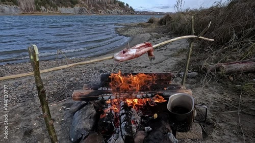 Making a drink on a fire in the forest. Tea. Coffee on the fire.