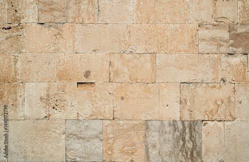 Wallpaper Mural Antique ancient stone wall masonry texture background. Old wall made of beige stone blocks  Torontodigital.ca
