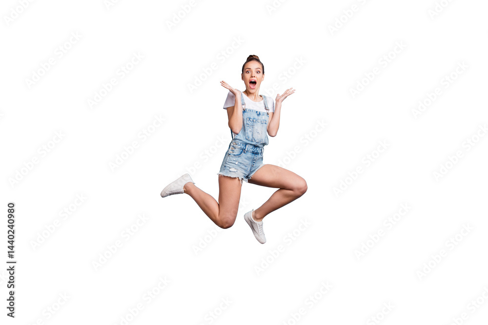 Full length body size photo of delighted astonished amazed girl seeing something unbelievable while isolated with blue background