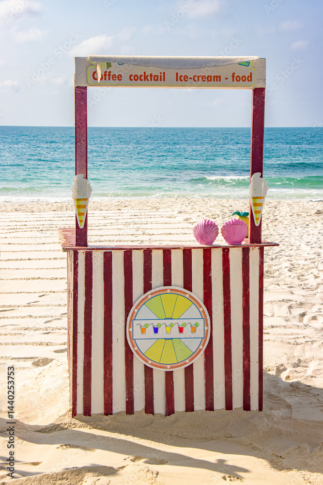 Wooden kiosk offering snacks on the sea beach