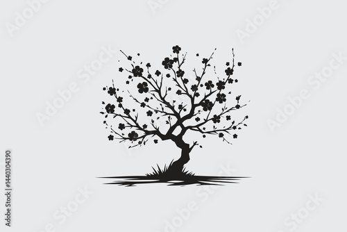 minimalist silhouette of cherry blossom tree in black and white