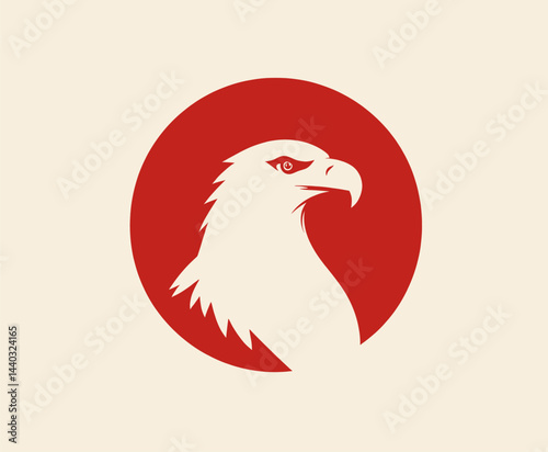 Eagle head profile in red circle on cream background