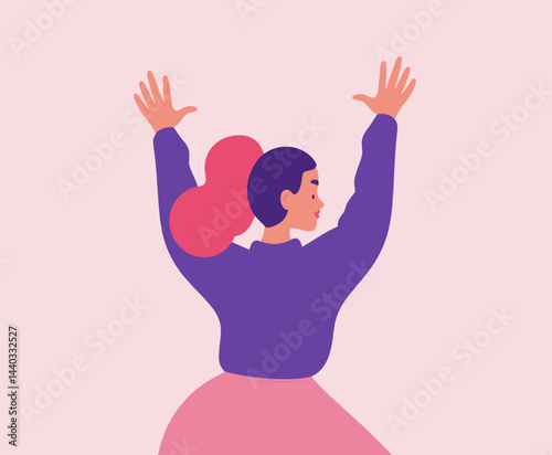 Woman with raised hands in celebration pose