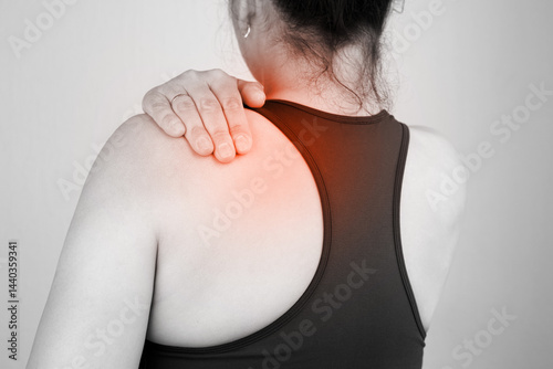 Obraz na płótnie Woman with neck and back pain rubbing painful area of w salonie