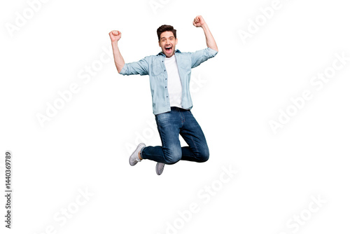 Full length body size photo of cheerful crazy ecstatic guy rejoicing with his favorite sport team having won competitions isolated jumping isolated over green vivid color background