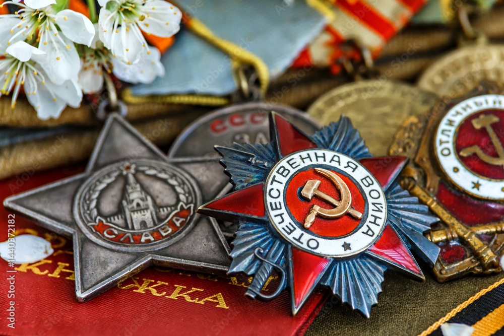 Fototapeta premium Orders and medals of the USSR.Awards of the Second world war close-up.Victory Day - 9 of may 1945. Soviet military awards.Phaleristics.Antikvariat.