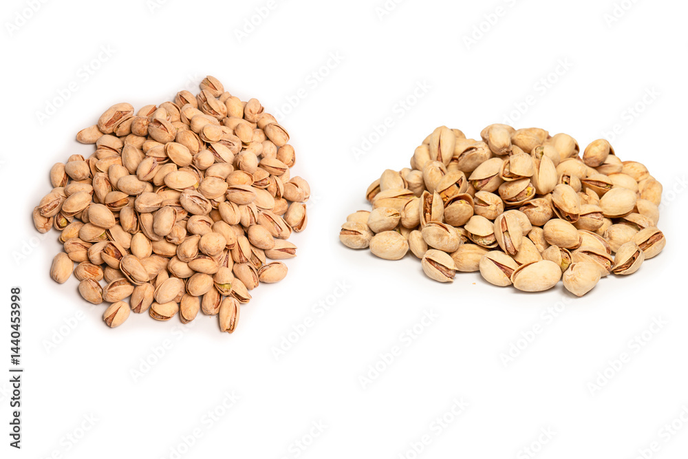 Fototapeta premium Tasty pistachios isolated on a white background.
