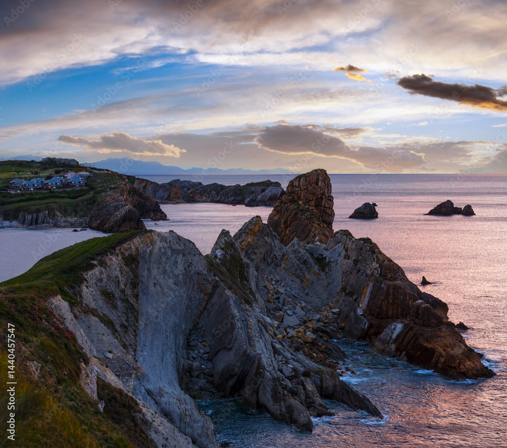 Sunset Atlantic ocean coastline near Portio Beach.