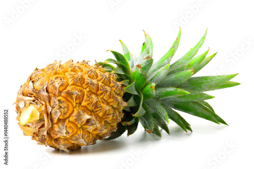 Yellow ripe pineapple with green leaves. isolated on white background.
