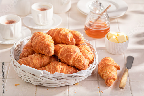 Obraz na płótnie Homemade and fresh french croissants served with coffee. w salonie