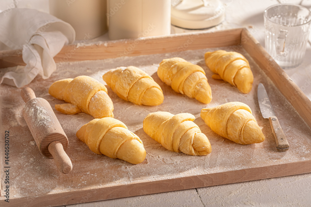 Sweet french croissants made of raw puff pastry.