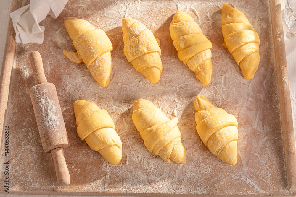 Traditionally french croissants made of raw puff pastry.