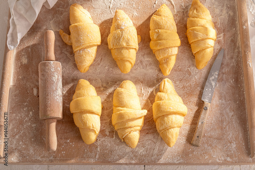Obraz na płótnie Traditionally french croissants preparation for baking in home. w salonie