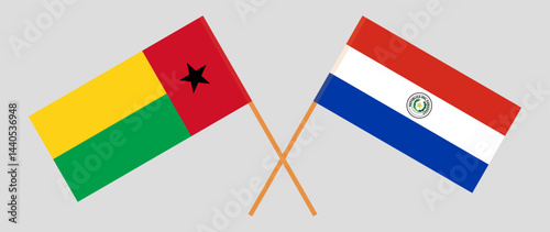 Crossed flags of Guinea-Bissau and Republic of Paraguay. Official colors. Correct proportion. Vector illustration
