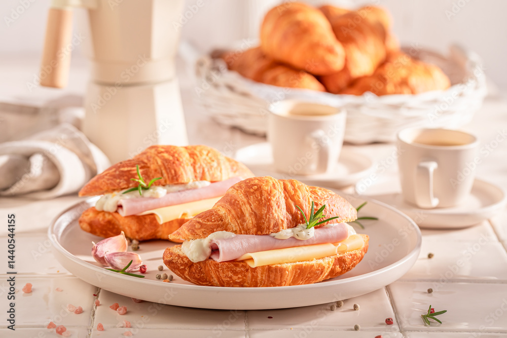 Homemade and hot french croissant served with coffee.