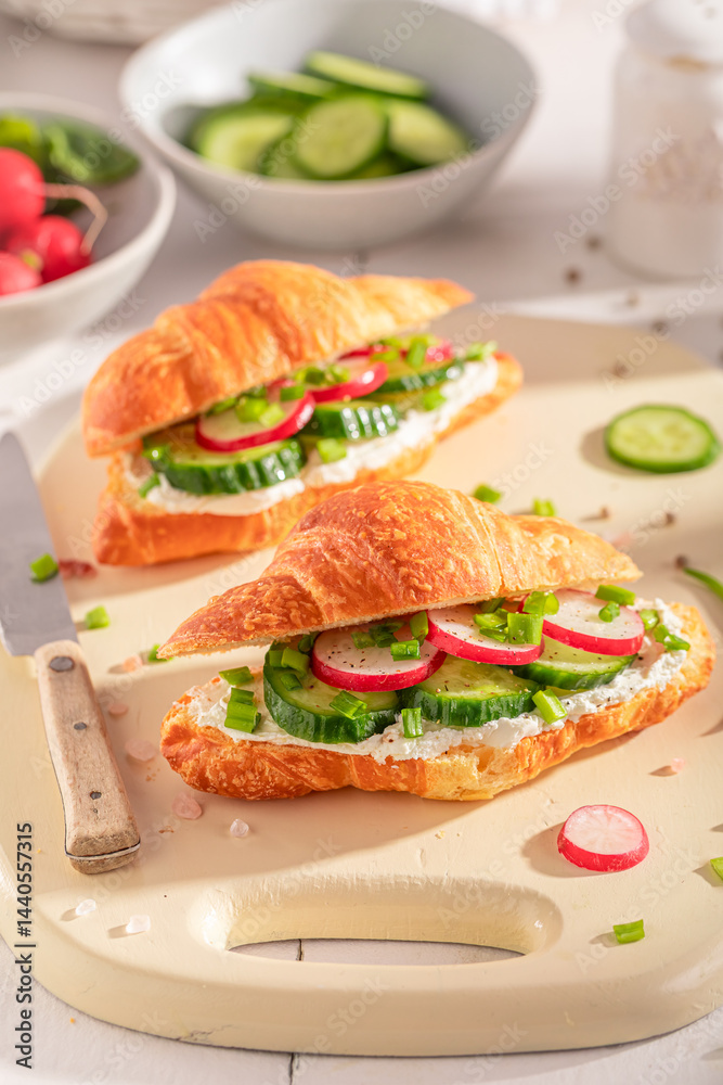 Golden and healthy french croissant as a sandwich for vegans.