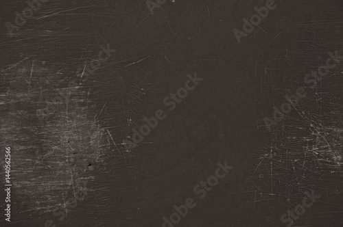 Scratched plastic surface with rough texture, seen up close	